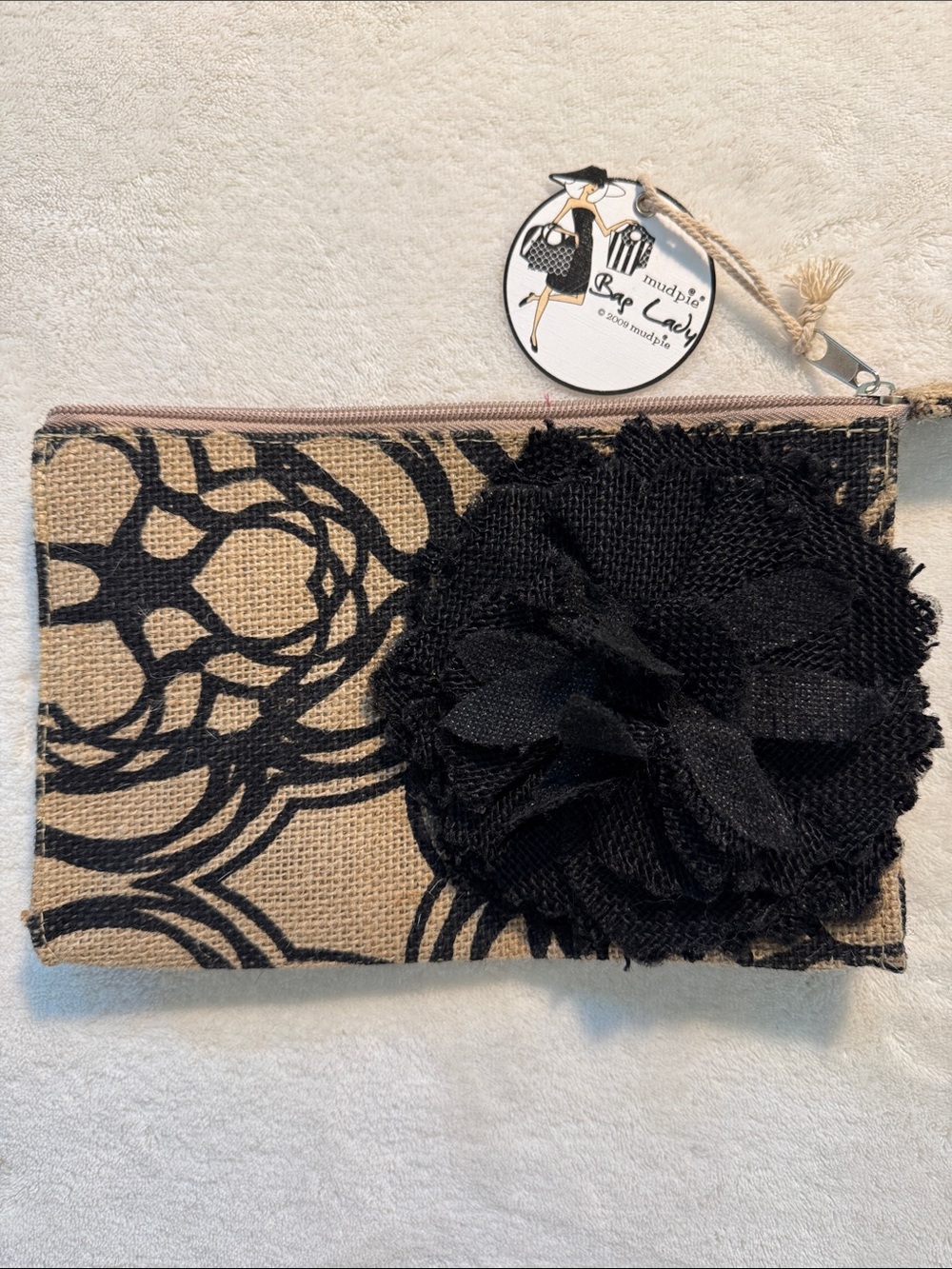Mud Pie Bag Lady tan/black floral zippered burlap clutch w/black burlap flower.